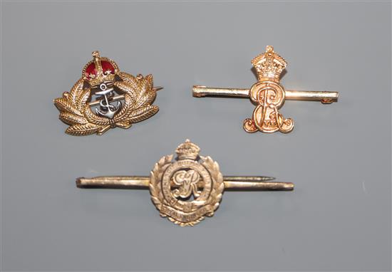 Three 9ct gold sweetheart bar brooches including one with red enamel,